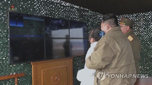NK leader inspects ICBM launch with his daughter