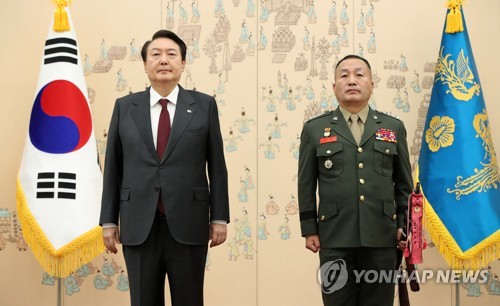 Yoon awards sword to new marine corps commander