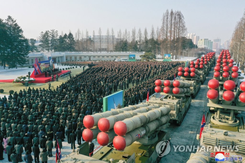 This photo, carried by North Korea's official Korean Central News Agency on Jan. 1, 2023, shows the North holding a ceremony to present its new super-large multiple rocker launcher to a plenary meeting of the ruling Workers' Party of Korea last week. (For Use Only in the Republic of Korea. No Redistribution) (Yonhap)