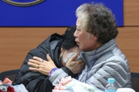 서울 전차서 미아된 두 여성 58년만에 가족 품에