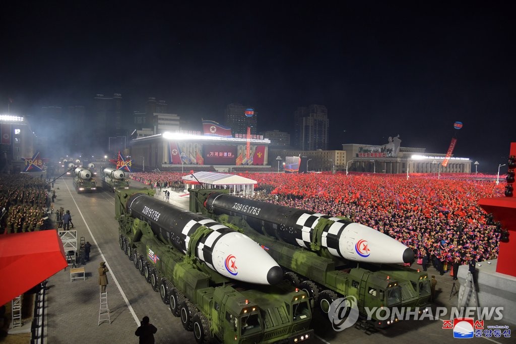 This file photo, carried by North Korea's official Korean Central News Agency on Feb. 9, 2023, shows the North showcasing Hwasong-17 intercontinental ballistic missiles during a military parade held at Kim Il Sung Square the previous day to mark the 75th founding anniversary of its armed forces. (For Use Only in the Republic of Korea. No Redistribution) (Yonhap)