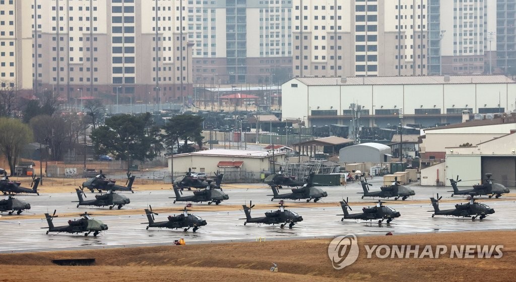 This photo, taken March 12, 2023, shows military choppers parked at Camp Humphreys, a major U.S. military base in Pyeongtaek, 65 kilometers south of Seoul. (Yonhap)