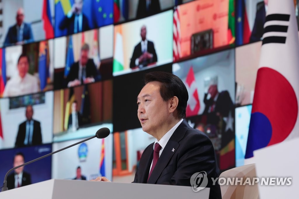 President Yoon Suk Yeol delivers remarks during the first plenary session of the Summit for Democracy via video links from the former presidential compound of Cheong Wa Dae in Seoul on March 29, 2023, in this photo provided by the presidential office. (PHOTO NOT FOR SALE) (Yonhap)