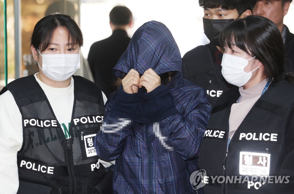 A suspected mastermind of a kidnapping-murder of a woman in southern Seoul attends a court hearing at Seoul Central District Court on April 10, 2023. (Yonhap)