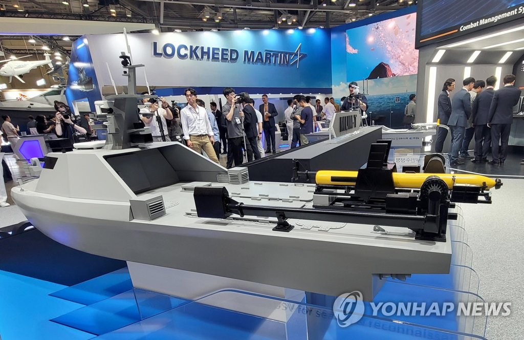 A model of an unmanned surface vehicle is displayed at Hanwha Systems' booth at the International Maritime Defense Industry Exhibition in Busan, 320 kilometers southeast of Seoul, on June 7, 2023. (Yonhap)