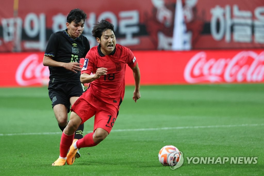 In this file photo from June 20, 2023, Lee Kang-in of South Korea (R) dribbles the ball against El Salvador during a men's football friendly match at Daejeon World Cup Stadium in Daejeon, some 140 kilometers south of Seoul. (Yonhap)
