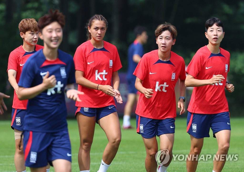 몸 푸는 선수들