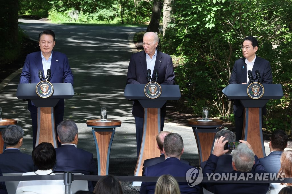 (From L to R) South Korean President Yoon Suk Yeol, U.S. President Joe Biden and Japanese Prime Minister Fumio Kishida conduct a joint press conference following a trilateral summit meeting at the Camp David presidential retreat in Maryland on Aug. 18, 2023. (Yonhap)