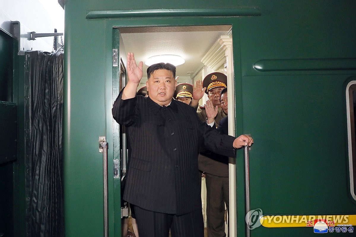 North Korean leader Kim Jong-un waves as he boards a train in Pyongyang on Sept. 10, 2023, to visit Russia to hold talks with Russian President Vladimir Putin, in this photo released Sept. 12 by the North's official Korean Central News Agency. (For Use Only in the Republic of Korea. No Redistribution) (Yonhap)