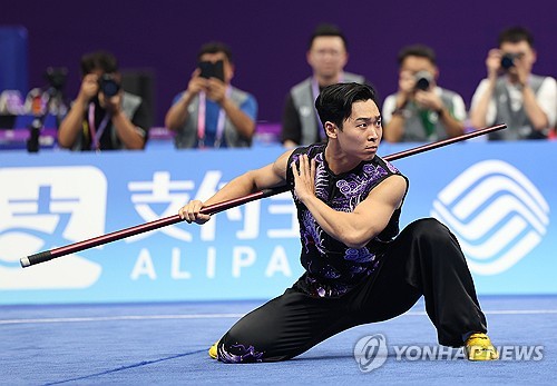 Lee Yong-mun wins wushu silver