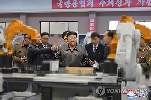 N. Korean leader inspects defense industrial firms