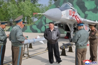 N.K. leader oversees anti-air combat, air raid drills