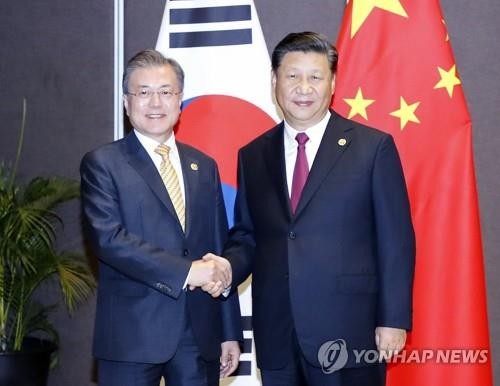 Moon to meet with China, Russia leaders at G-20 summit